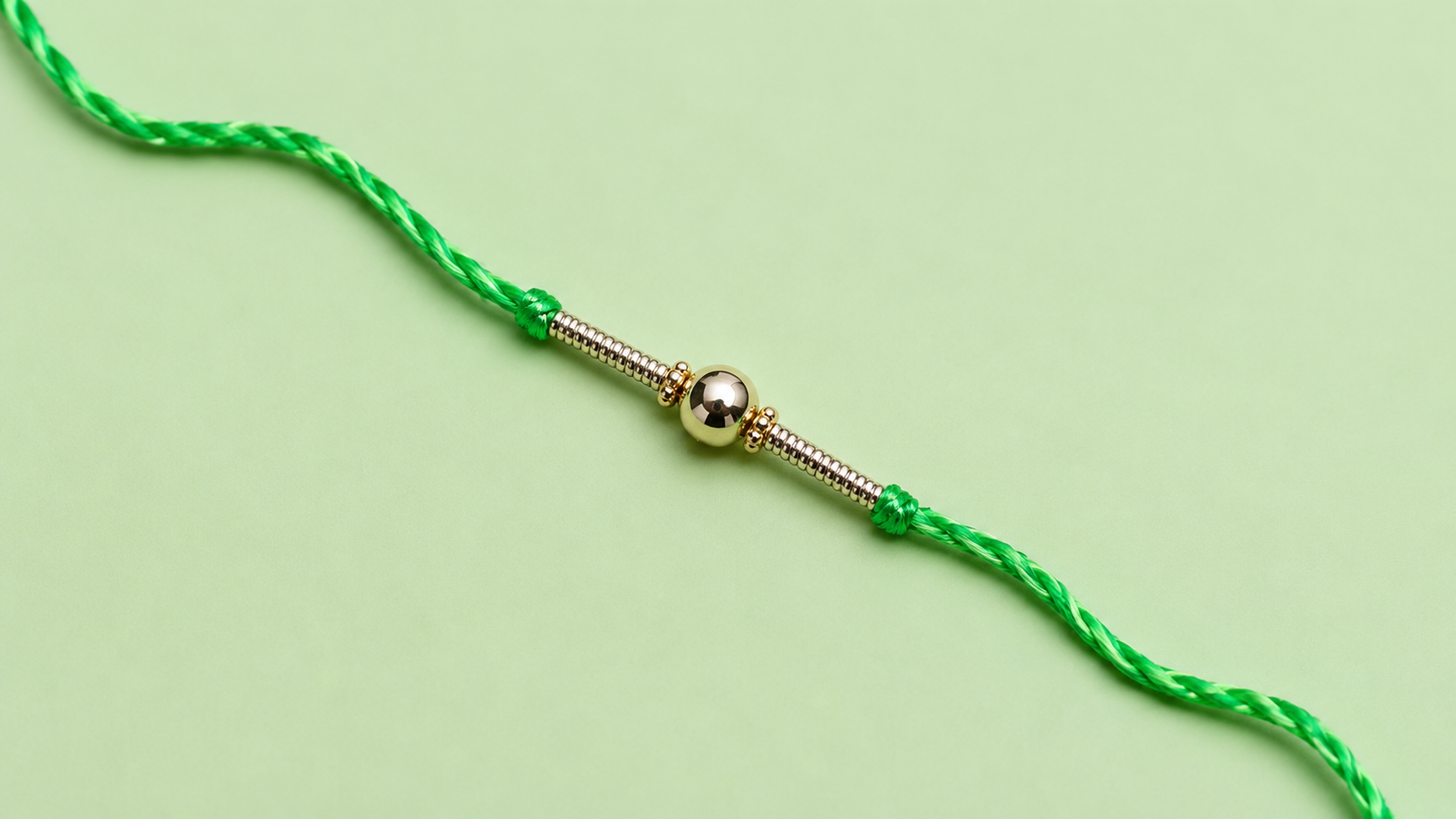 Simple Green Thread Rakhi with Golden Bead