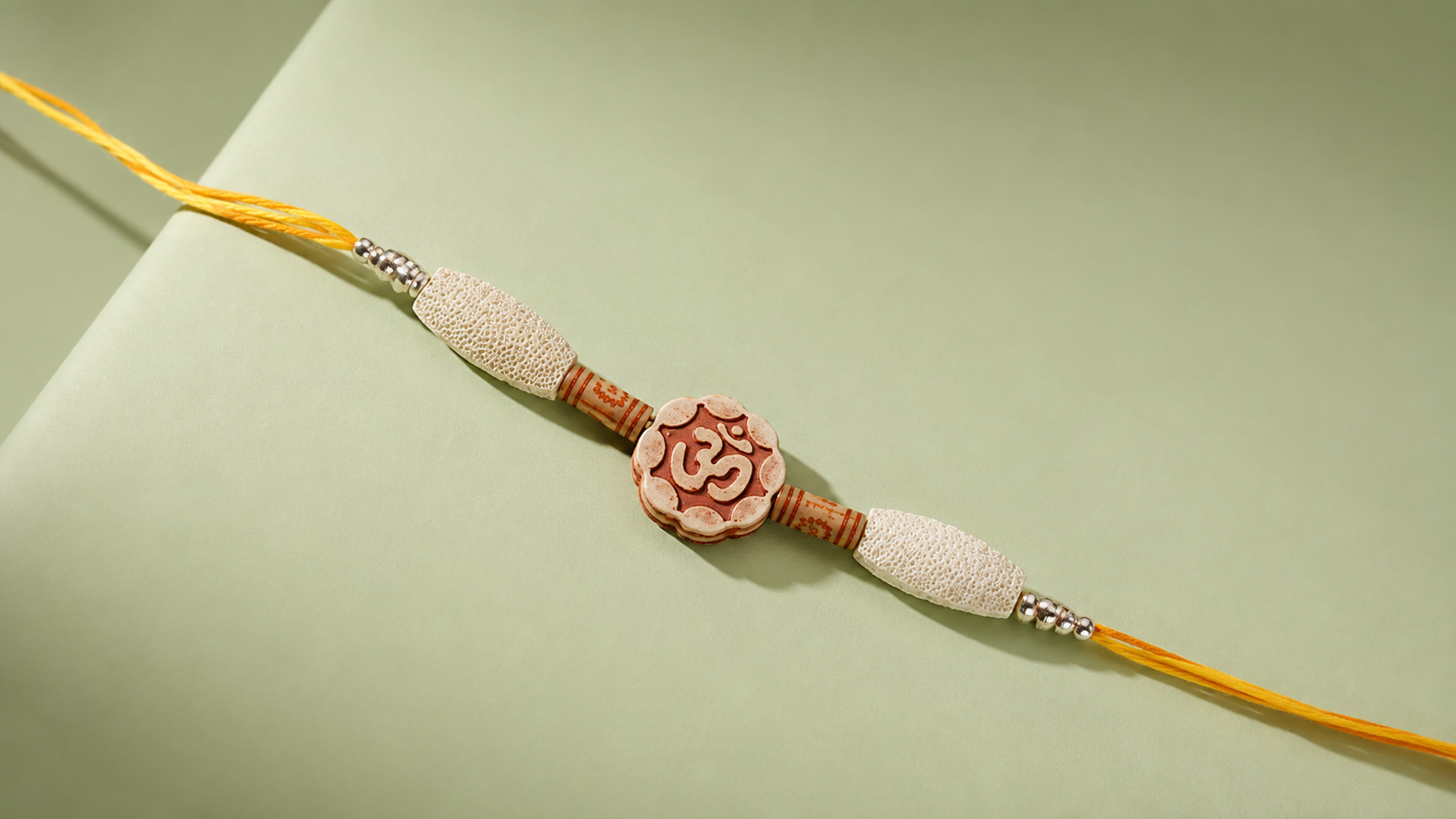 Chandan Scented Rakhi with Traditional Om Design