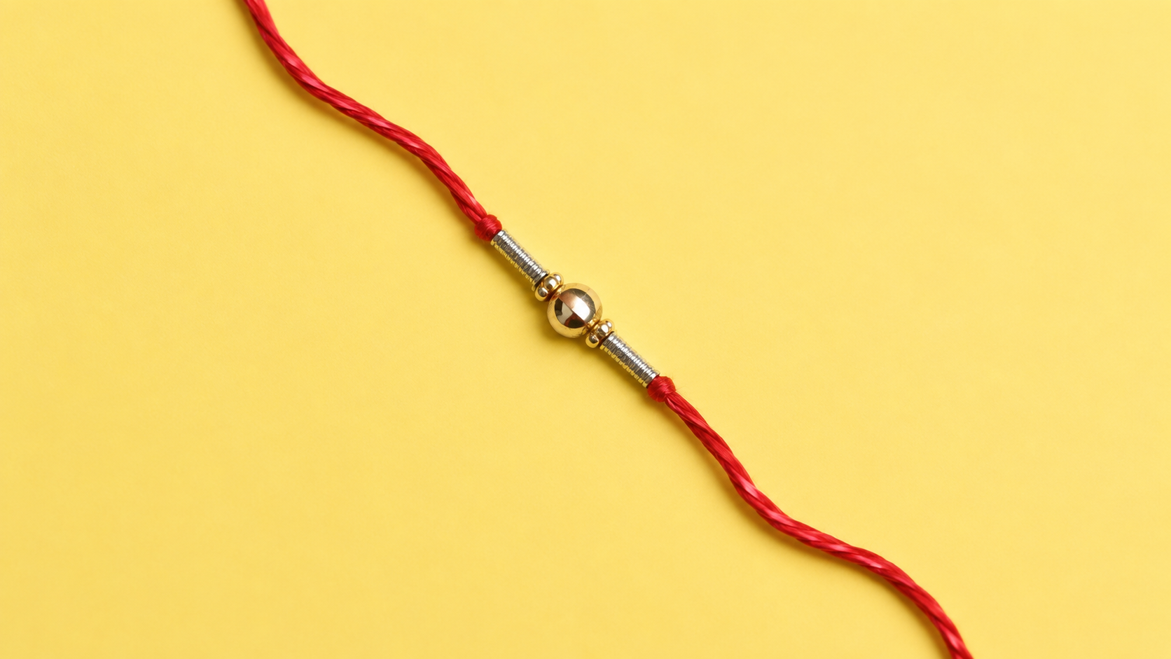 Simple Red Thread Rakhi with Golden Bead