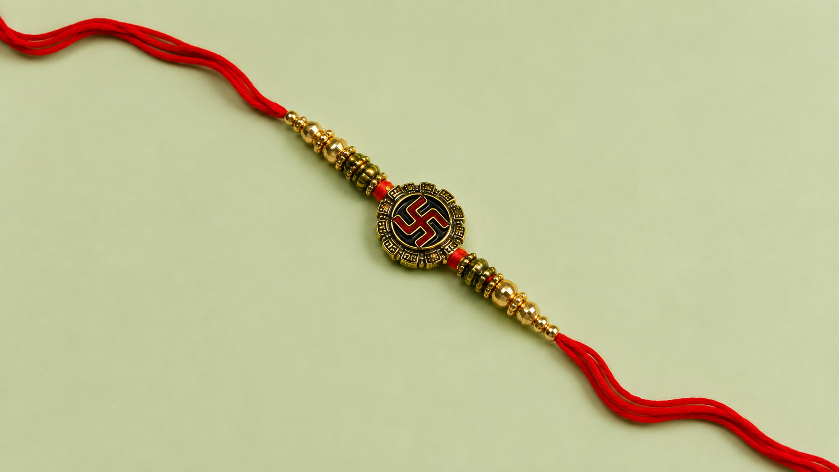 Red Thread Gold Swastik Designer Rakhi